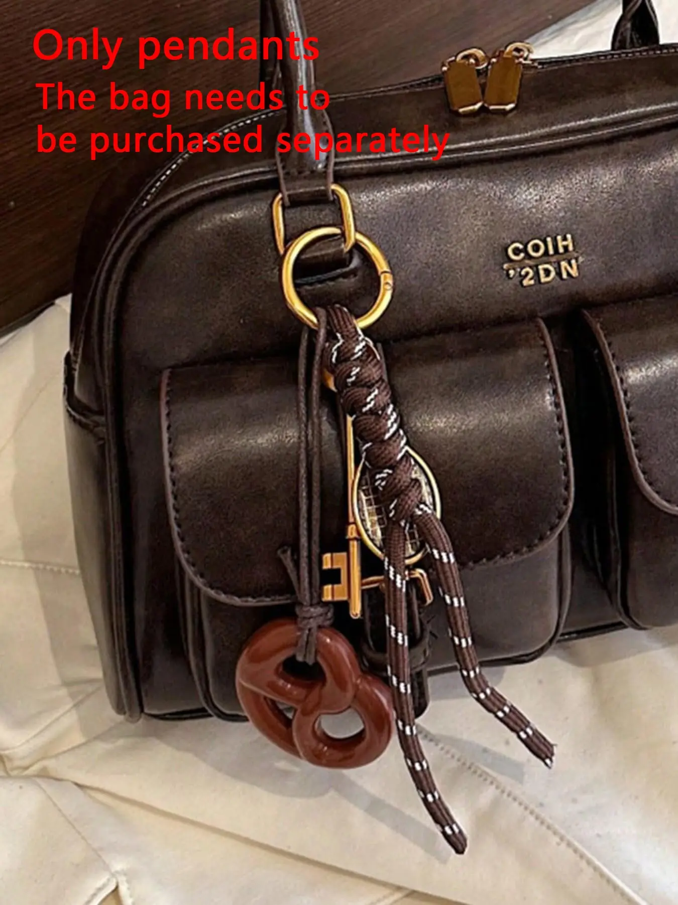 A niche and exquisite retro texture alkaline water knot pendant with woven ornaments, key and racket pendant design, convenient and easy to carry, can be used as a bag ornament, keychain, and can be carried around