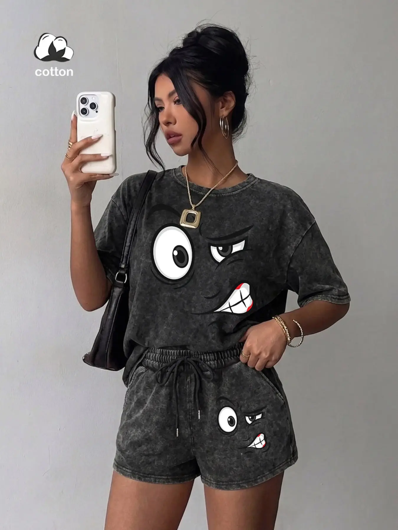 2-Piece Set: Cartoon Expression Print & Distressed Washed Finish. Heavyweight fabric; shorts feature an elastic drawstring waist. A versatile, essential, Casual look—pair with white sneakers for an effortless summer outfit.