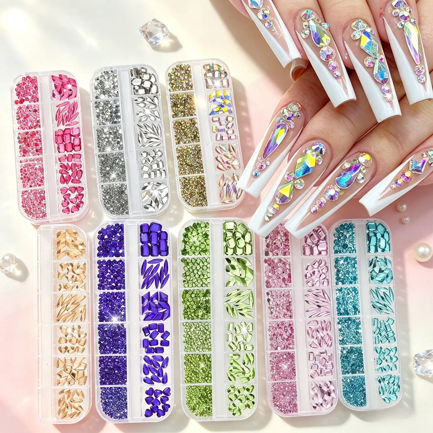 Luxury 12-grid nail rhinestone box with heart & teardrop flat crystals, Mixed resin rhinestones. Multi-cut transparent stones with rich luster fit all nail tip shapes, versatile sparkling supplies for home handmade craft and salon bulk manicure designs.