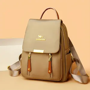 A Stylish And Versatile Women'S Backpack Made from High-Quality Materials That Are Durable And Wrinkle-Resistant, Featuring a Unique Flap Design with an Exquisite Metal Logo That Showcases a Minimalist And Elegant Style. It Includes Dual Zipper Pock