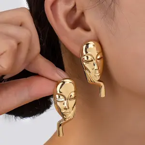 Personalized face gold-plated stud earrings, trendy women's alloy texture fashionable earrings