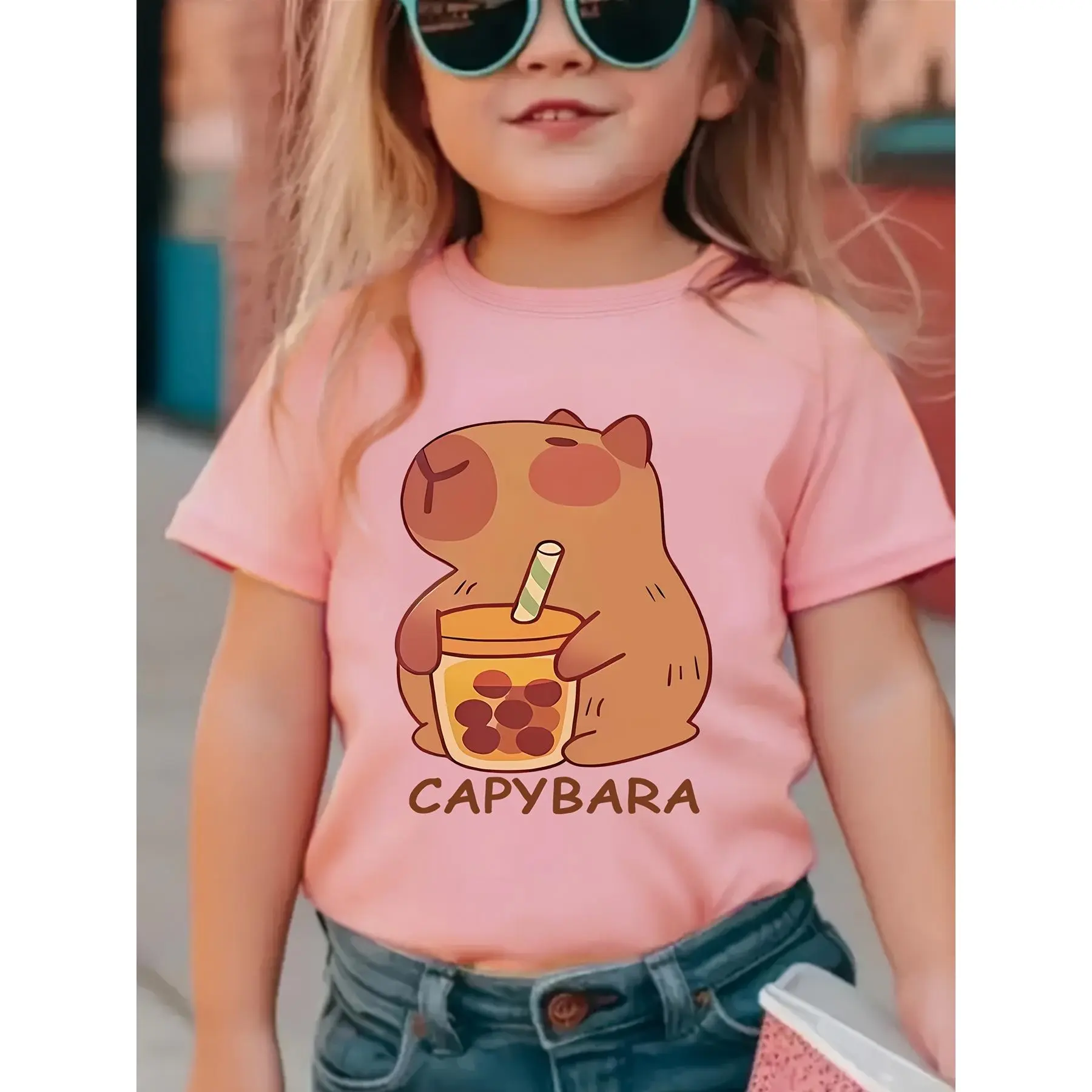 Girls' Capybara Print Top in Medium Stretch Polyester, Casual Regular Fit for All Seasons, Machine Wash or Dry Clean, Cute Print Tops, Polyester Knit, 13-14Y, Short Sleeve Tee, Crew Neck, Animal Print