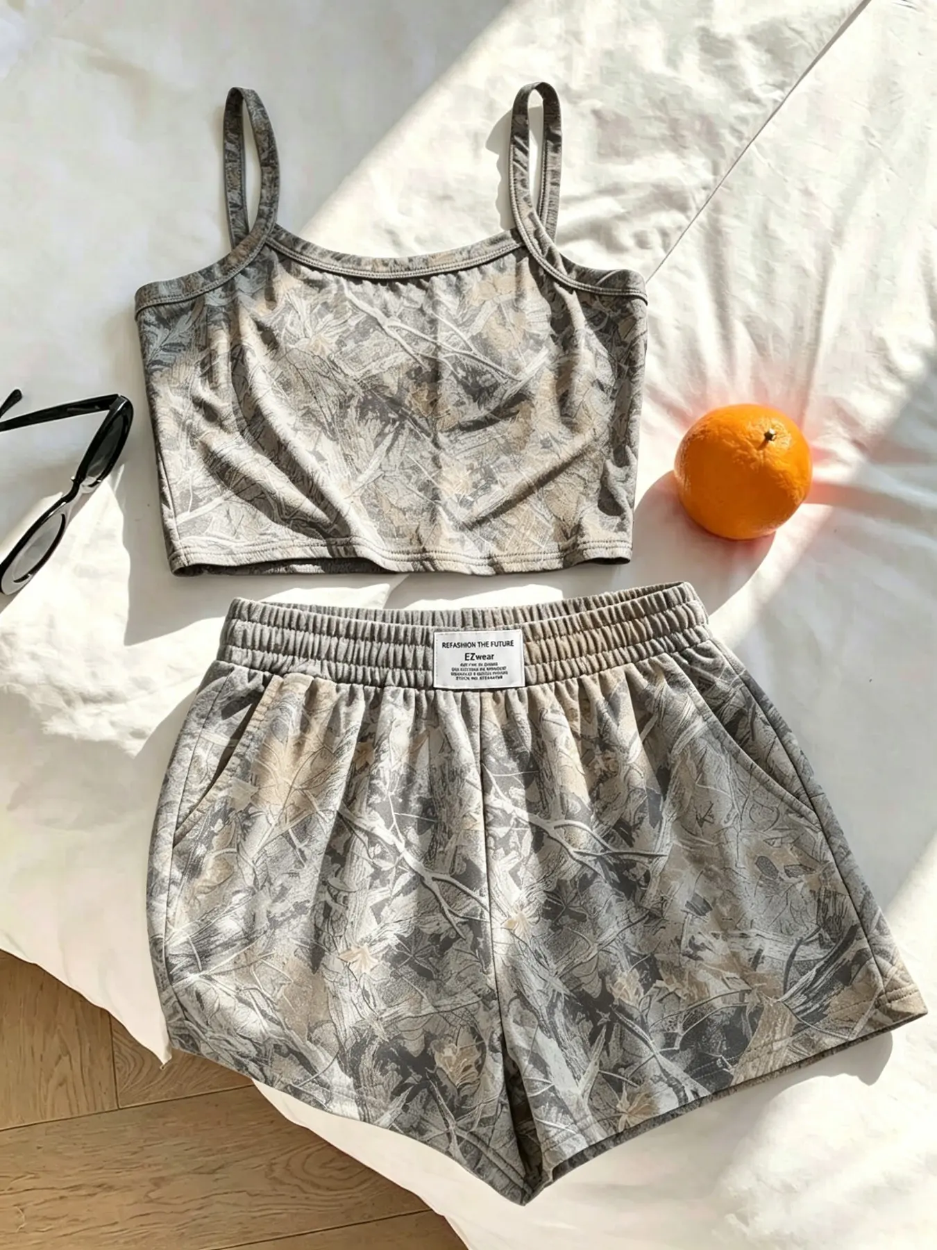 2-Piece Y2K Women's Set: Tree Camo Crop Cami + Elastic Waist Pocket Loose Shorts. Tree camouflage print. Perfect for summer loungewear, workout wear, and American street style outfits. Crop Top