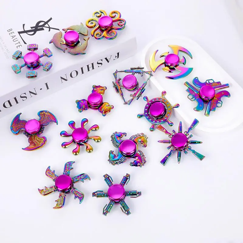 4Pcs random colorful metal fidget spinners. Premium alloy with smooth spinning. Great stress relief toy for daily use, perfect for relaxing and sharing with friends.