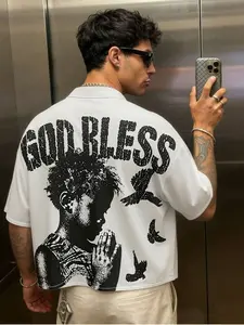Men’s Solid White Cropped Short Sleeve Camp Collar Button Up Shirt, Back Distressed Cracked Bold "GOD BLESS" Letter Print, Black Grainy Praying Boy Silhouette With Flying Dove Graphic, Loose Boxy Spiritual Street Casual Blouse