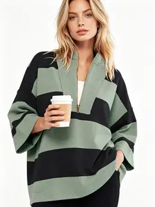 A women's fashionable and lazy style color blocked large striped seven quarter sleeve hoodie with a half zipper loose top, suitable for summer, light sports, island, suburban travel, home leisure, and dating.