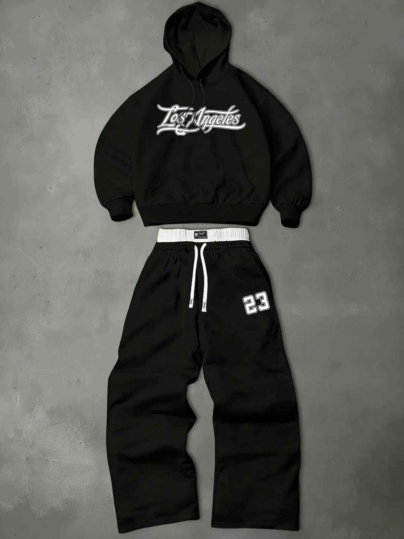 Unisex Loose-Fit Black Hoodie and Sweatpants Two-Piece Set, Warm Fleece Lining, Breathable Loose Casual Sportswear, Vintage 90s Hip-Hop Streetwear Outfit. Cropped Drawstring Hoodie with Los Angeles Cursive Print, Draped Wide-Leg Jogger Pants Printed with