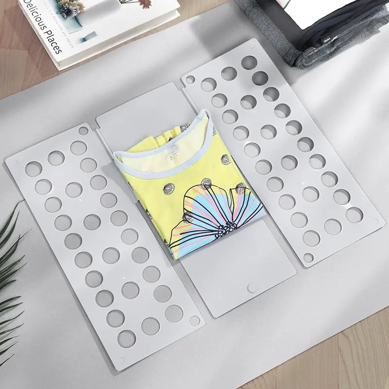 1pc Clothing Folding Board, Efficient Shirt Folding Tool for Small Living Spaces, Durable Plastic Material, Compact Storage Solution