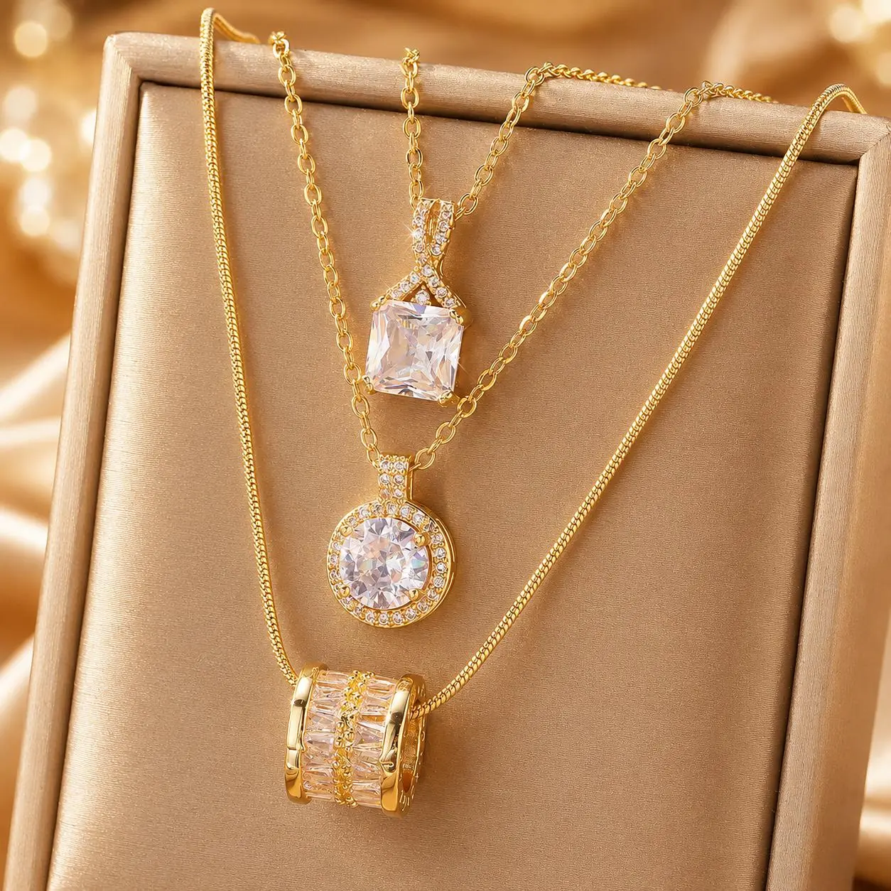 Costume Jewelry Necklace Bundle, Fashion Accessory Set for Daily Wear 3-Piece Gold Tone Crystal Pendant Necklace Set for Women, Trendy Dainty Layered and Stackable Jewelry Bundle, Square Round and Barrel Charm Statement Necklaces  Party  Best Sellers