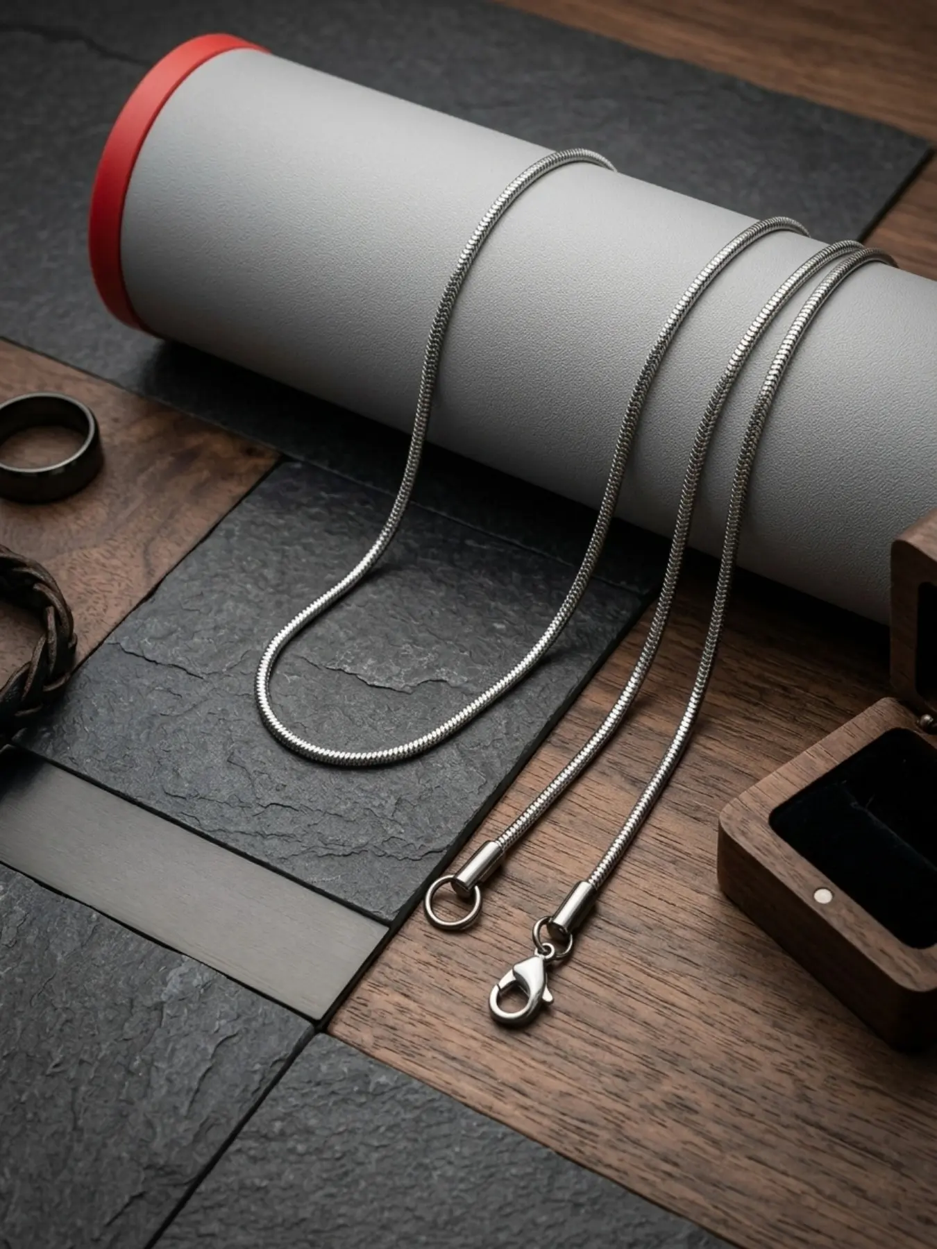 An elegant silver snake chain necklace jewelry with a hip-hop style, its classic and timeless design is suitable for everyday wear and various occasions.