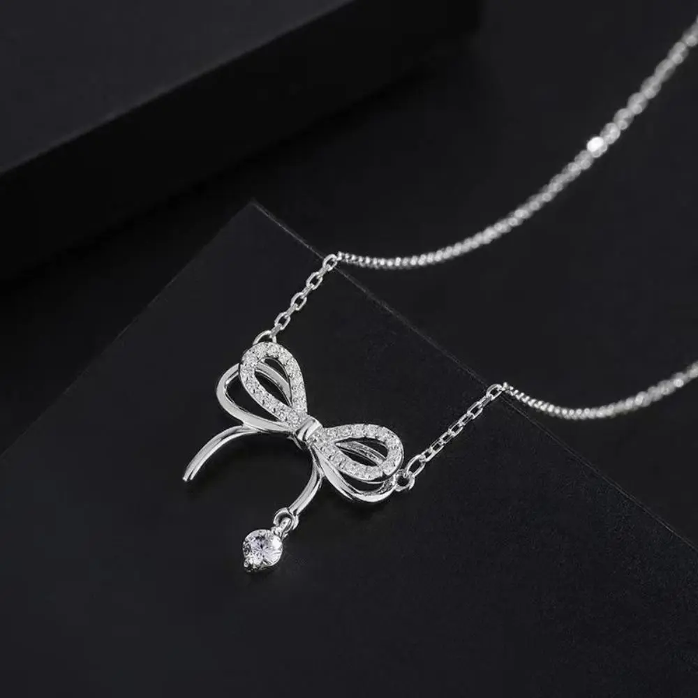 Women's Dainty Double-Layer Bow Bag Charm - Viral Aesthetic Design, Elegant Water Drop Tassel Pendant, Polished Metal Slim Chain, Lightweight for Daily Wear & Casual Chic Outfits
