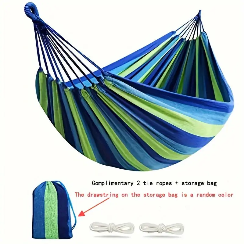 A Versatile Outdoor Garden Camping Hammock Suitable for All Four Seasons, Featuring Tree Straps for Easy Hanging. This Durable Hammock Can Support up to 204.12 KG and Comes with a Travel Bag for Portability. It's Perfect for Outdoor Picnics