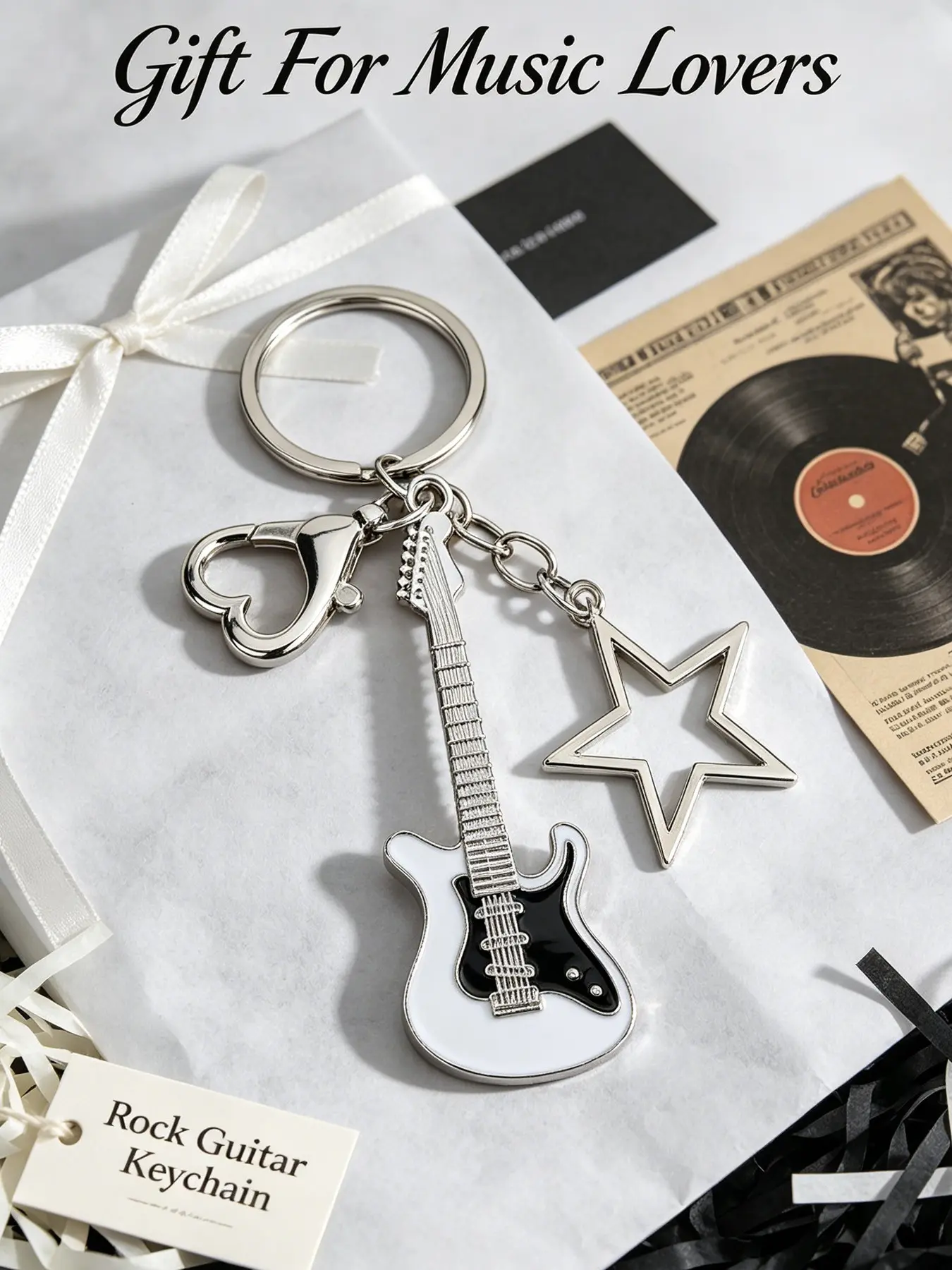 White & Black Viral Rock Guitar Keychain, Y2K Music Lover Bag Charm with Electric Guitar Pendant. Hollow star & heart carabiner, vintage aesthetic backpack accessory, ideal birthday & concert gift for teen rock fans and musicians