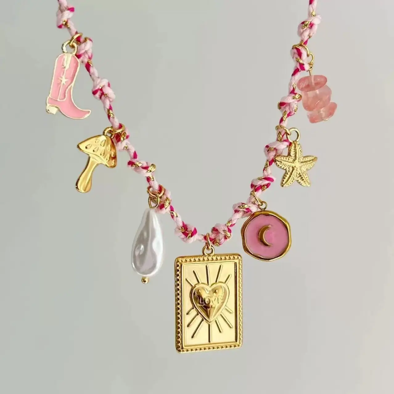 New stainless steel necklace and bracelet set featuring an oceanic style with seashell and starfish motifs-minimalist, affordable luxury, perfect for vacations.