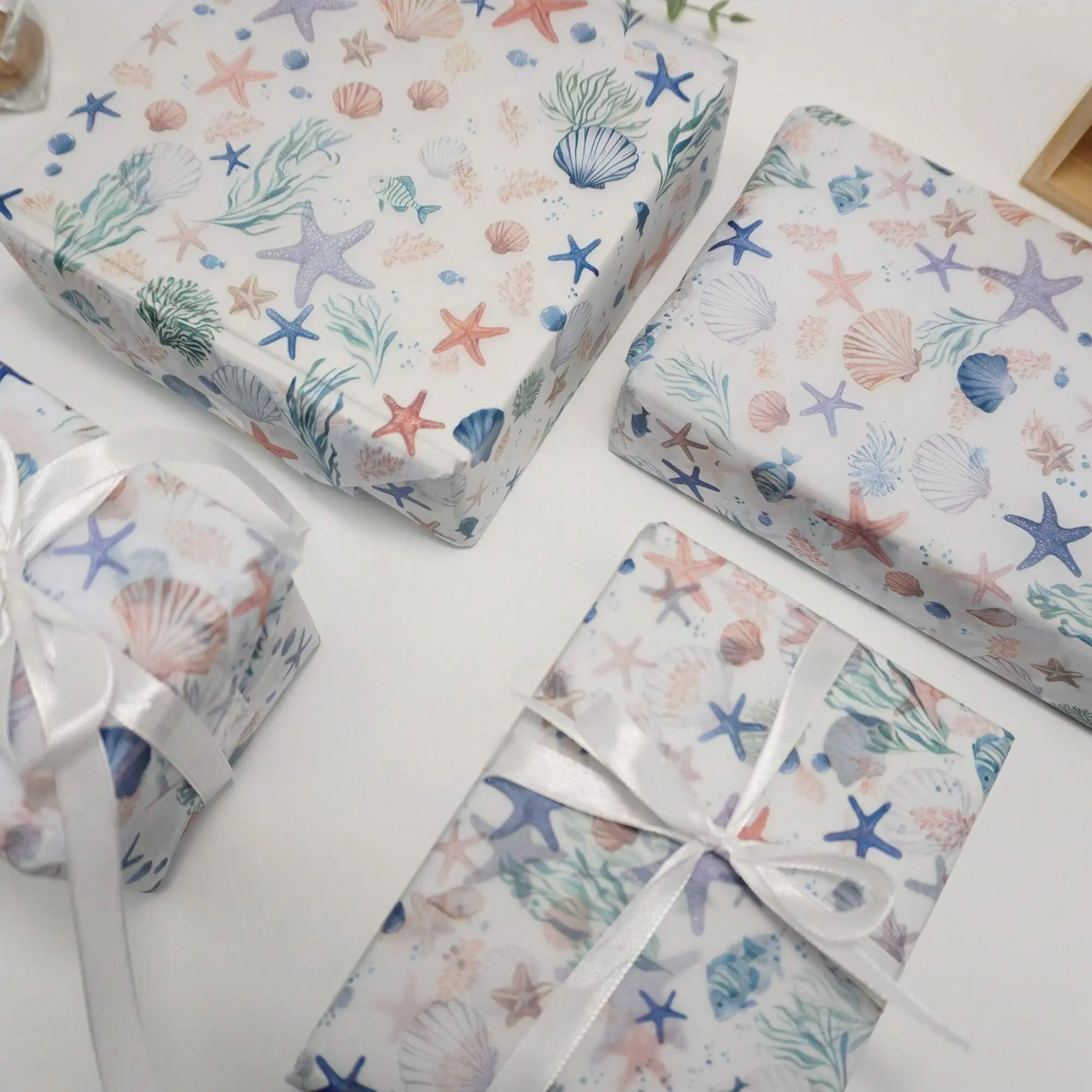 Colorful seashell starfish pattern packaging tissue paper, bouquet supplies, gift wrapping paper, flower wrapping paper, cute wrapping paper, suitable for decoration at parties, birthdays, weddings, and any other occasions