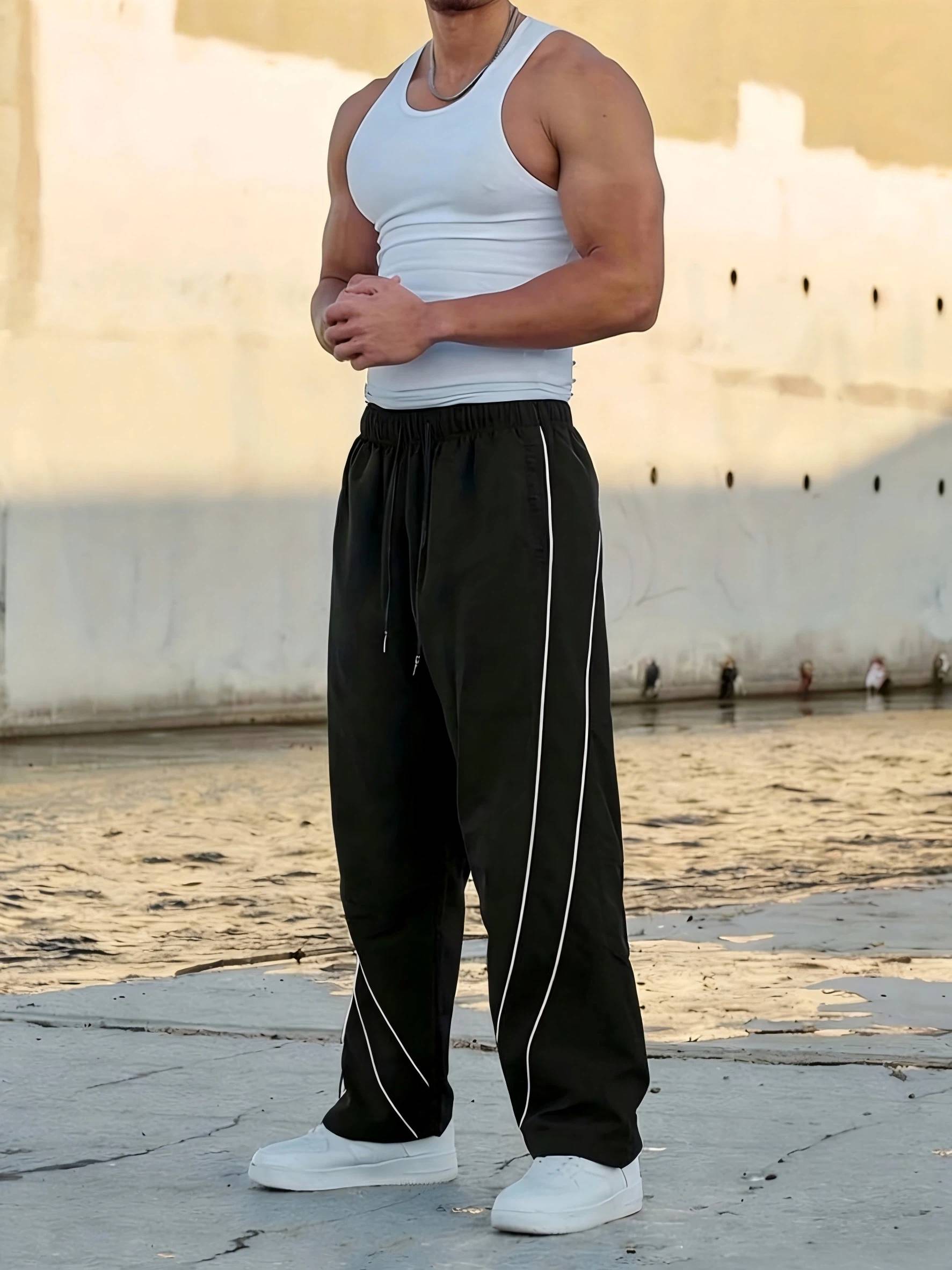 "YOUNG" Embroidered Track Pants | Black Streetwear Wide-Leg Bottoms SpringStatements