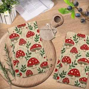 Set of two: Autumn Mushroom Design Kitchen Towels. Crafted from ultra-soft microfiber, these quick-drying hand towels and tea towels feature a modern, cartoon-style pattern of red and white mushrooms. Dimensions: 23.62 x 15.75 inches.
