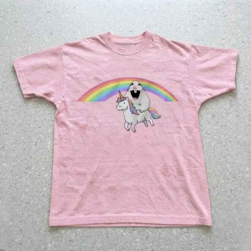 cute tee with graphic of a unicorn with a hamster above it cute tee with graphic of a unicorn with a hamster above it
