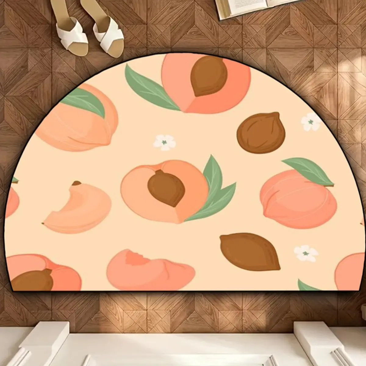 1 printed floor mat in a pink peach semi-circular design. This soft pink-colored floor mat is decorated with peach and leaf patterns and is suitable for use in indoor areas such as kitchens and living rooms.