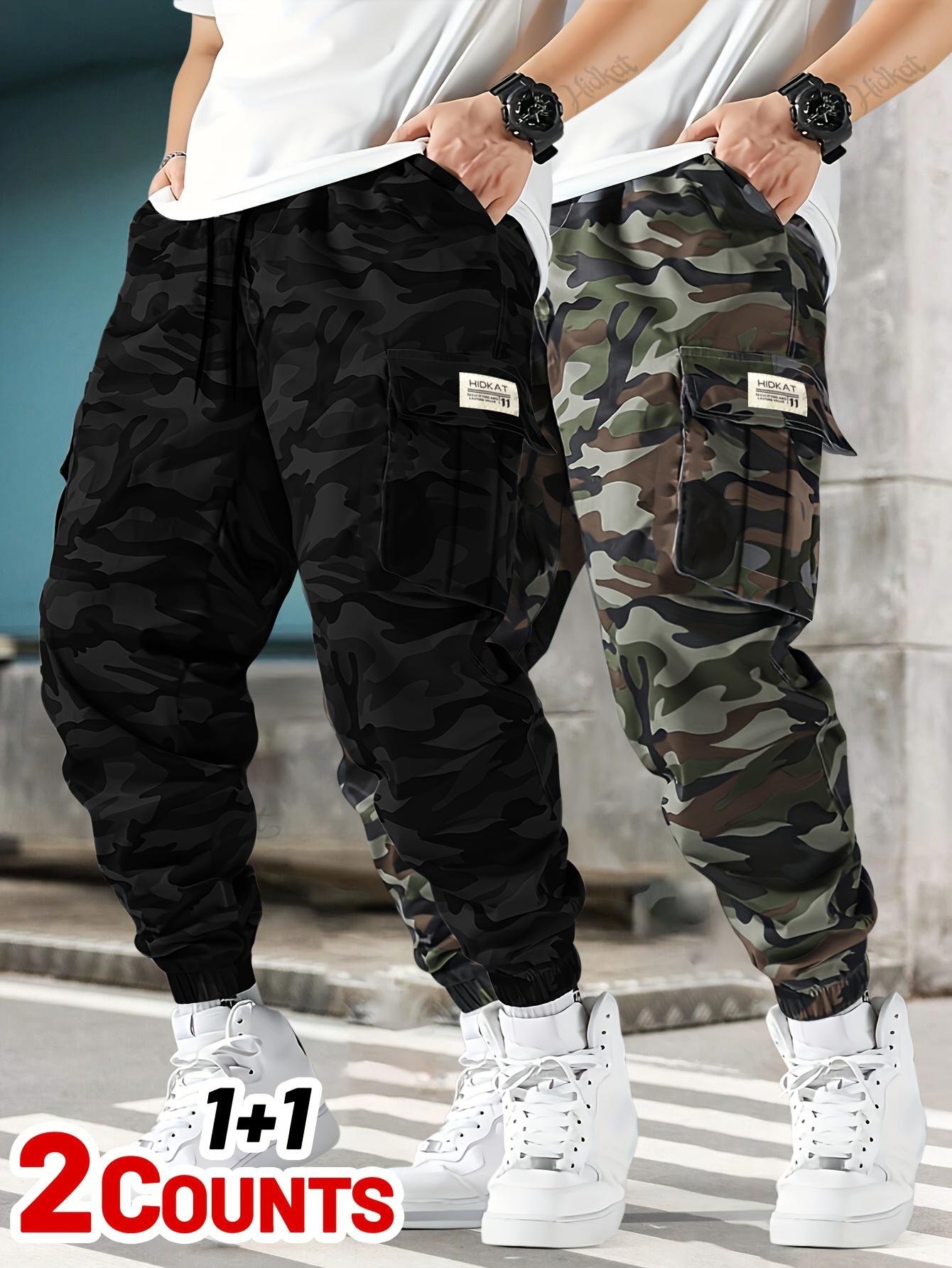 Men's 2-piece camouflage workwear, ankle tied casual pants Multi pocket drawstring elastic waist loose sports pants set Outdoor military style camouflage work pants two-piece combination