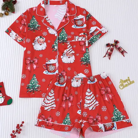 Women's 2-piece Christmas pajama set, red base with Santa, Christmas trees, bows and hot cocoa prints. Classic cozy festive style with white contrast trim. Lapel short sleeve top with pocket, elastic waist shorts, soft all-season loungewear Pjs
