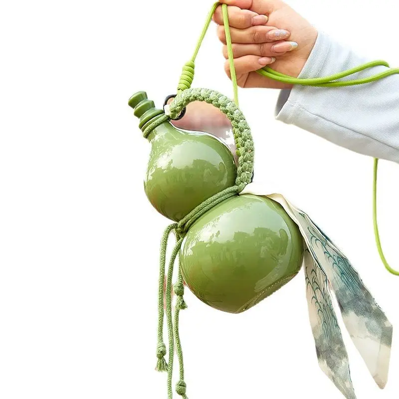 A 500ml ceramic-style glass gourd bottle, perfect for use as a water bottle, wine bottle, beverage bottle, or whiskey bottle, and an ideal gift choice vrial product refill