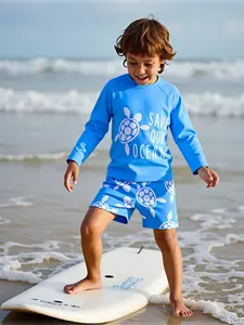 Boys' two-piece long-sleeve swim set made from quick-drying, stretchy fabric, featuring swim trunks with an elastic waistband—perfect for the beach, the pool, summer camp, and family outings