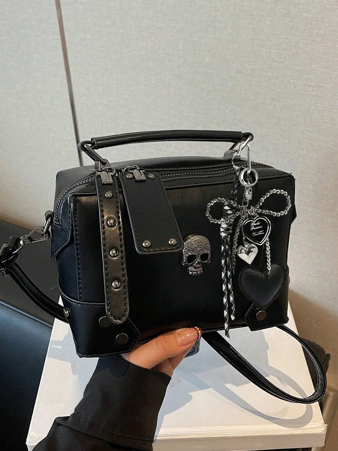 Street punk style elegant and exquisite texture handbag, skull pattern design, pendant design with heart, bow and woven rope elements, fashionable and niche design, versatile single shoulder crossbody bag, Casual trendy handbag