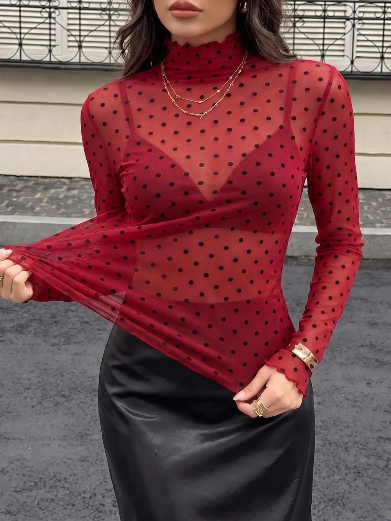 Retro-style red polka dot sheer mesh turtleneck long-sleeved shirt, perfect for an autumn date.