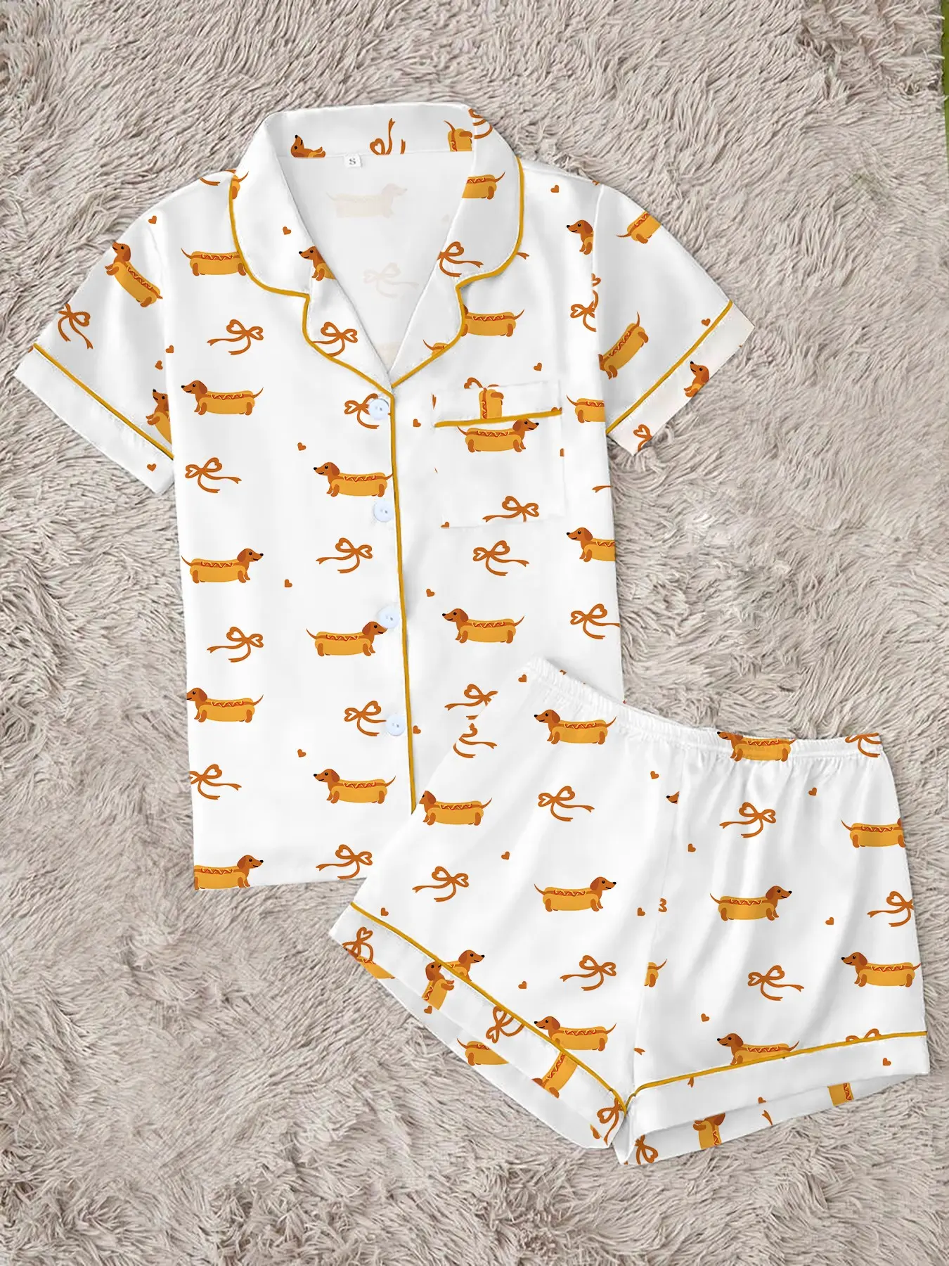 Quirky Wiener Dog & Bow Print Pajama Set for Women | Cute Hot Dog Dachshund Button Up Sleepwear | Soft 2-Piece Short Sleeve Summer Lounge Set with Orange Piping | Fun Sleepover PJs | Cozy Pet Lover Gift Knit Loungewear Sets