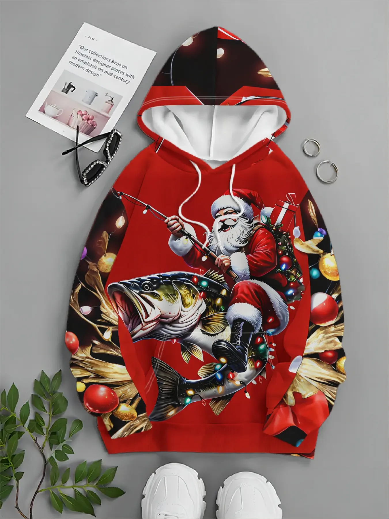 Men's trendy brand streetwear hooded sweatshirt with Santa Claus and a big fish angler for fishing. The gift is decorated with Christmas ornaments - full of streetwear style, with rich pattern elements and an artistic touch.