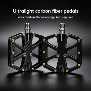 Ultralight carbon fiber road bike pedals with a hollow design for lubrication and effortless operation