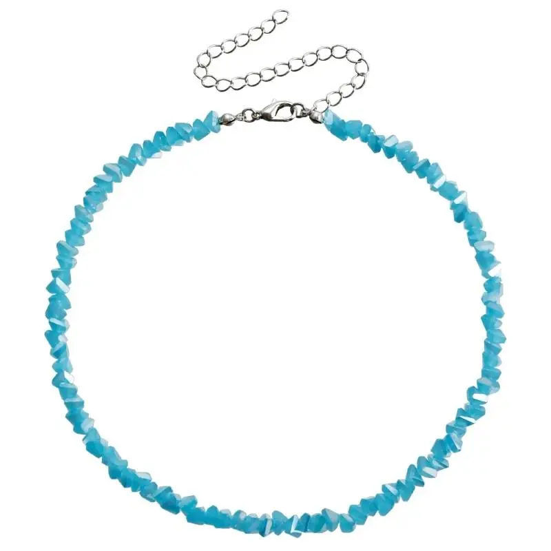 A clear crystal necklace with a full circle carved on a flat surface in 2026, a delicate, translucent small bead close-fitting collar chain, and a quiet luxury that sparkles. The stacked necklace is worn by women on dates, weddings and parties every da