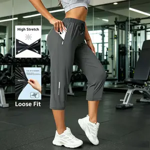 Ladies' summer cool and refreshing ice silk cropped pants, made of high-elastic and breathable fabric, with a loose cut, drawstring waistband, and side pockets with zipper design, suitable for daily wear and outdoor sports