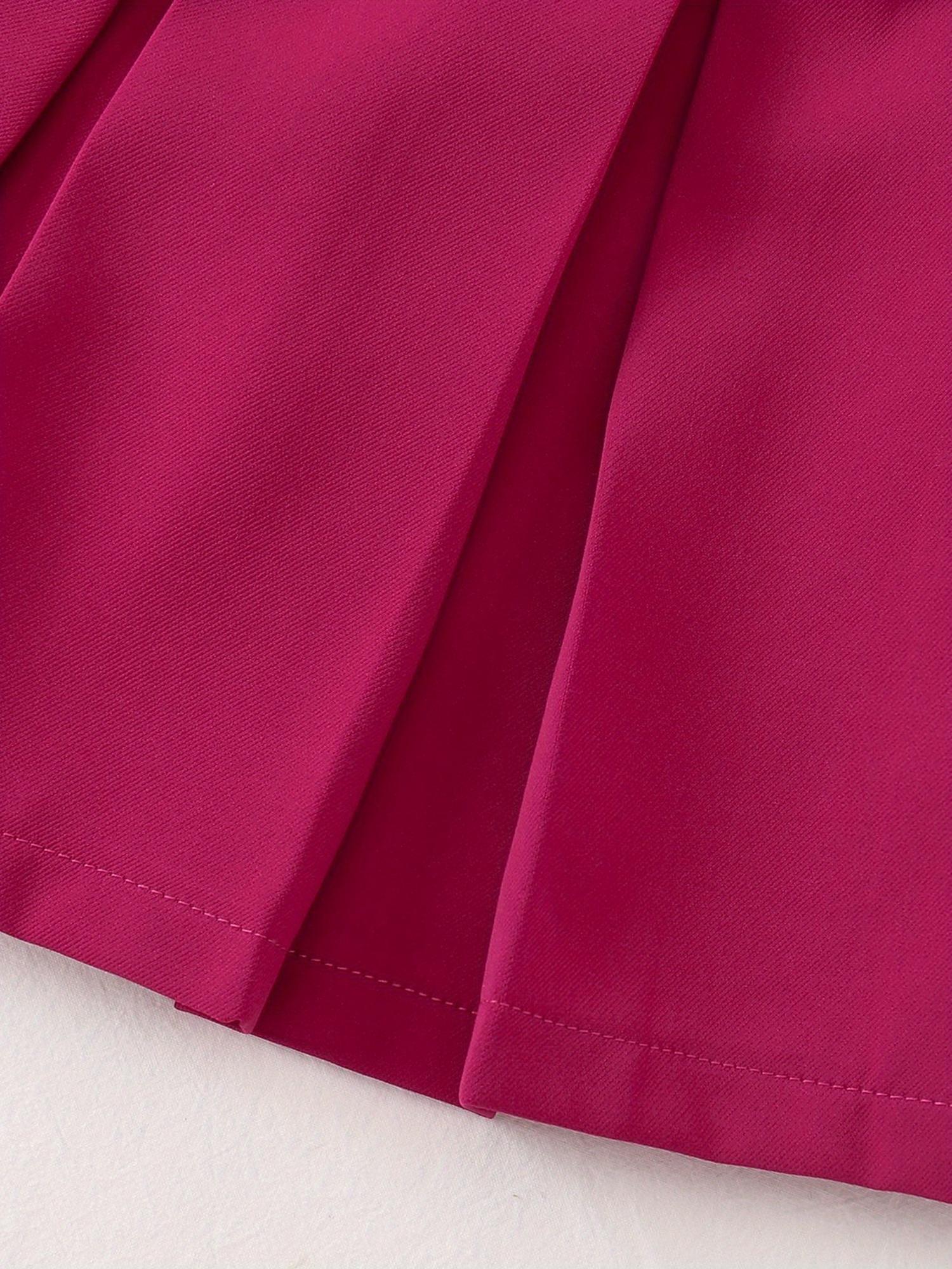 Girls' Dress, The Main Body Is Rose Red, The Shoulders Are Decorated with Flower-Like Folds, And The Long-Sleeved Design. with a Black Belt, There Are Golden Letters in The Middle of The Belt, And The Skirt Is Pleated. The Overall Style Is Sweet And Fa