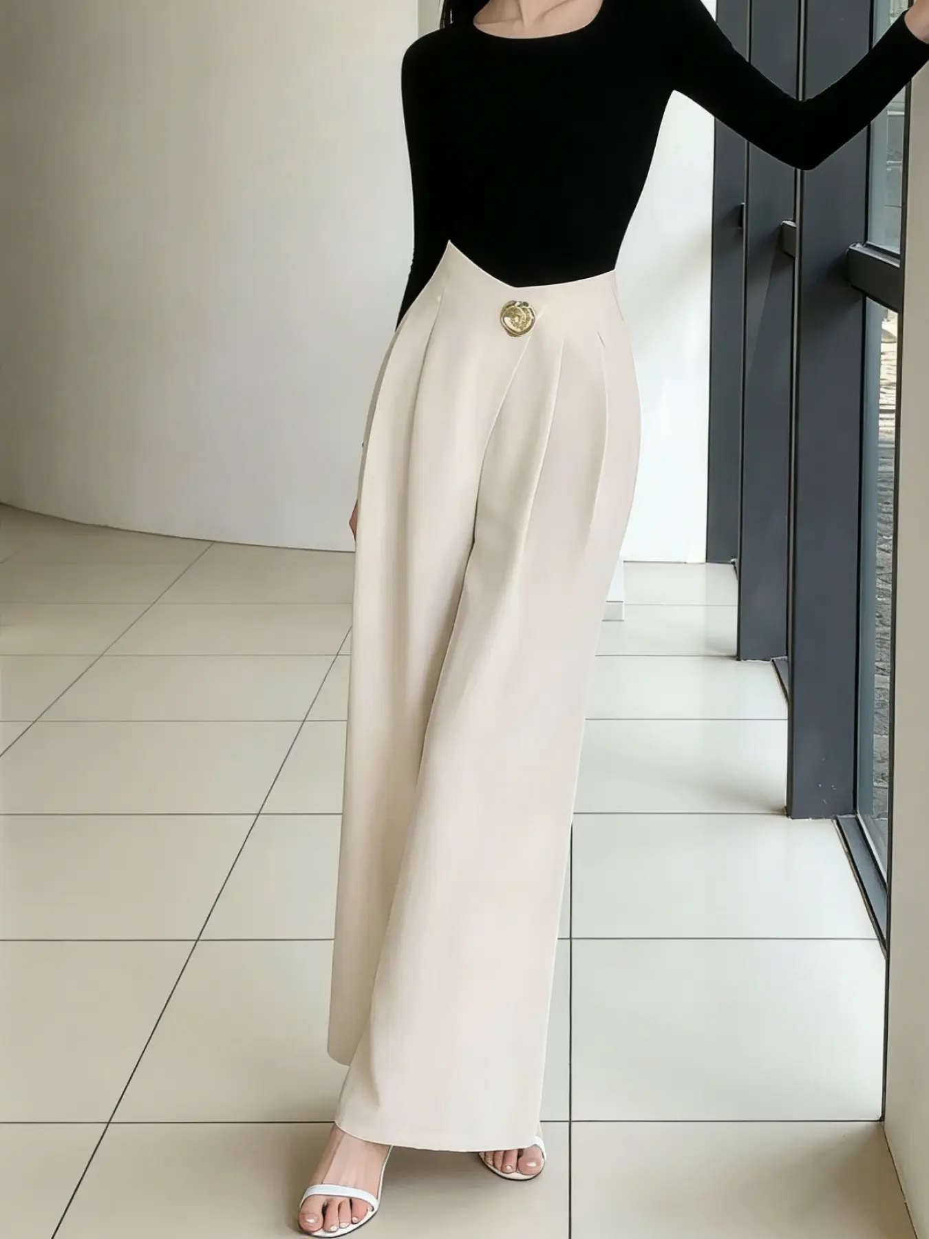 A stylish peach-colored high-waisted wide-leg pants for women, a sleek slim-fit office suit pants, a unique design casual long trousers suitable for all seasons, perfect for home, indoor, and outdoor wear