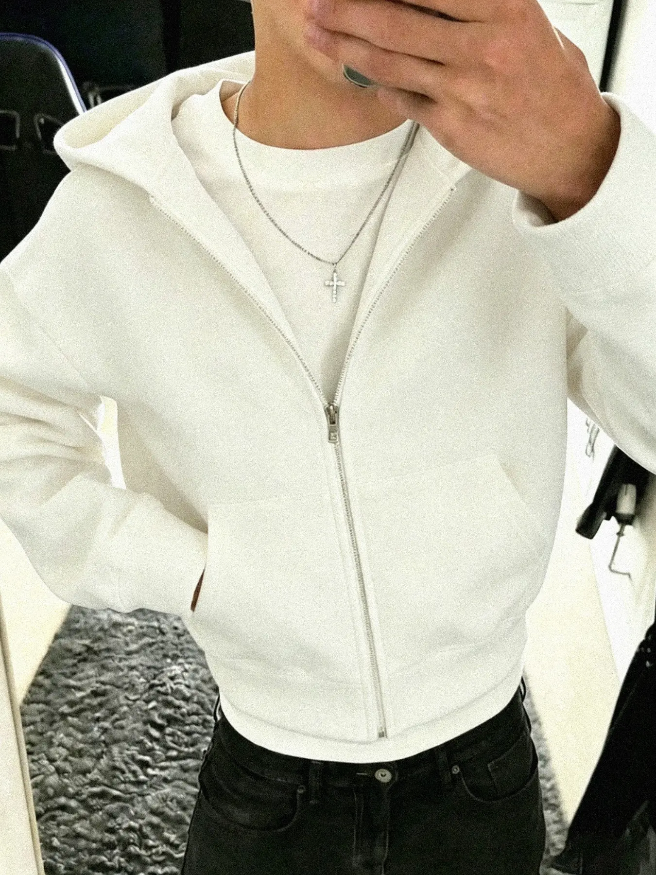 Men's cropped hooded sweatshirt with a full-zip front. Crafted from soft, skin-friendly fabric, this lightweight, unlined style is perfect for transitional weather. Versatile enough to be worn on its own or layered. Available in multiple colors—an essenti