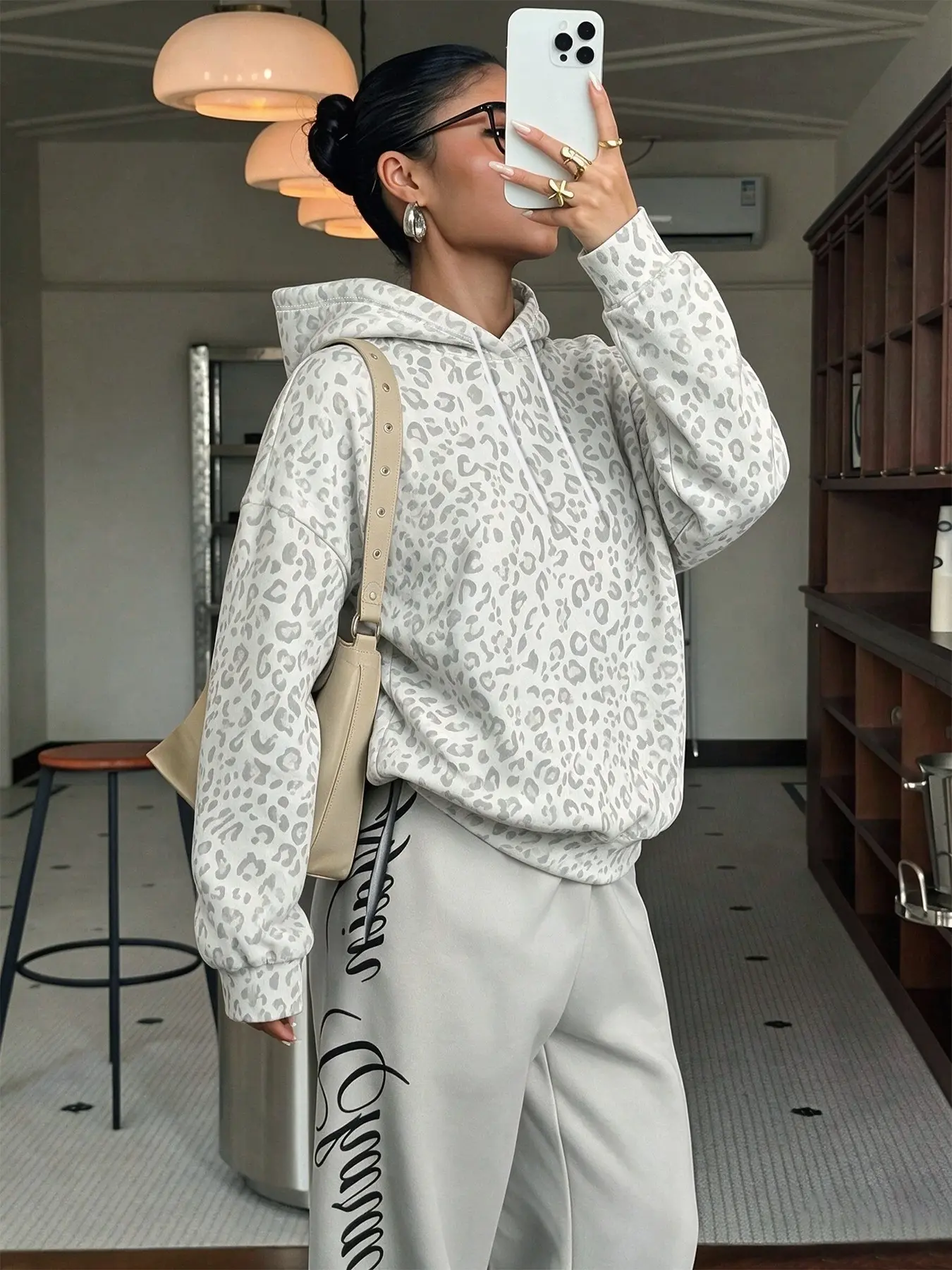 Trendy light-colored leopard print loose hoodie, women's casual pullover with drawstring hood, perfect for a lazy everyday look, coffee outings, commuting, going out, or dating, a stylish piece for fall and winter #LeopardHoodie