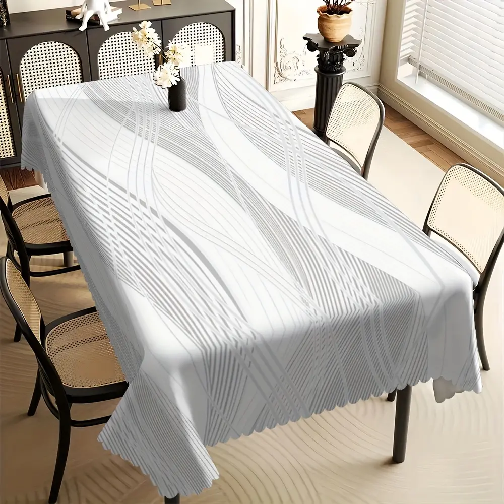 One elegant grey geometric checkered rectangular tablecloth with scallop edges, made of polyester fabric, is perfect for use in restaurants, kitchens, living rooms, hotels and party decorations.