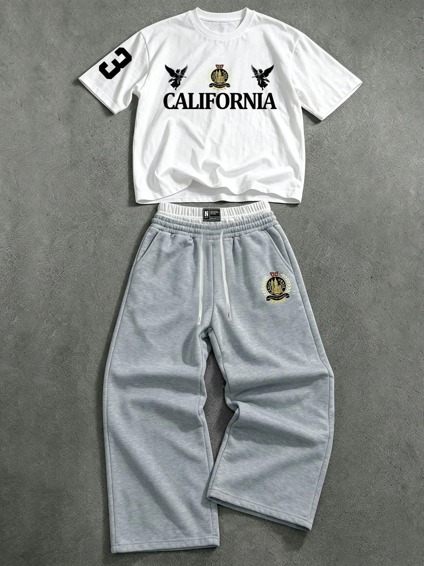 Retro casual outfit: American retro short-sleeved Aesthetic Graphic T-shirt + loose trousers. Perfect for everyday wear, such as commuting, shopping, playing basketball, or creating a Y2K street style.
