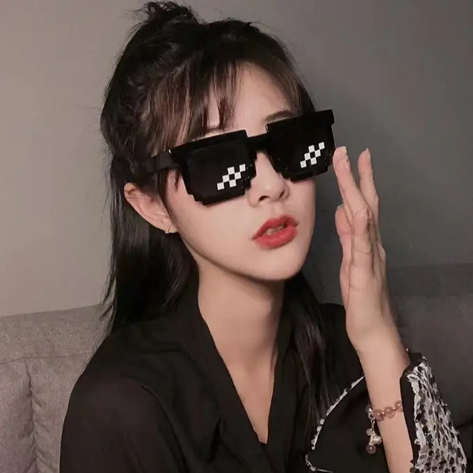 Pixel-style party sunglasses—fun, quirky glasses featuring an 8-bit pixelated mosaic pattern; perfect for cosplay, birthday parties, and various festive events.