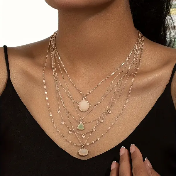 1 Bohemian-style multi-layer chain necklace with multiple pendants, seven-layer combination for women, suitable for vacations, parties, and everyday wear