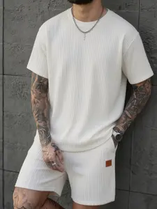Men's summer knitted jacquard two-piece set, round-neck short-sleeved top and drawstring shorts. Summer casual wear, comfortable and fashionable, suitable for daily use and outdoor activities.