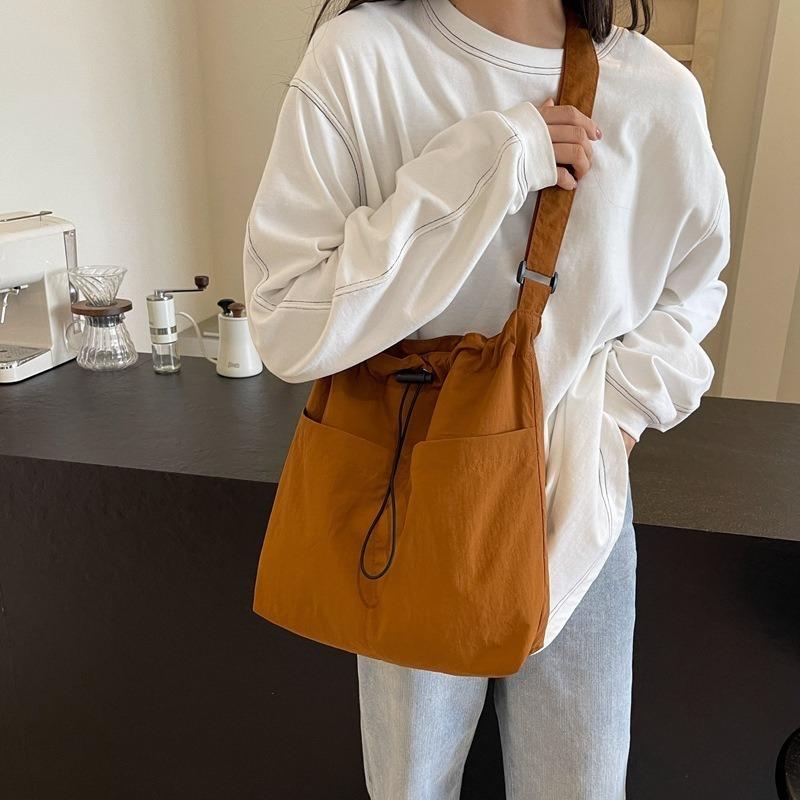 Casual fitness bag, new Korean-style casual crossbody bag, street-style simple shoulder commuter bag, bucket bag for women tote handbags luxury designer real