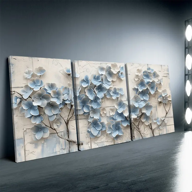 The product is a flat/2D feature, not 3D, with a frame. It is a 3-piece floral canvas wall painting, featuring light blue flower branches. It is a framed canvas painting suitable for living rooms, bedrooms, corridors, and art and craft decoration