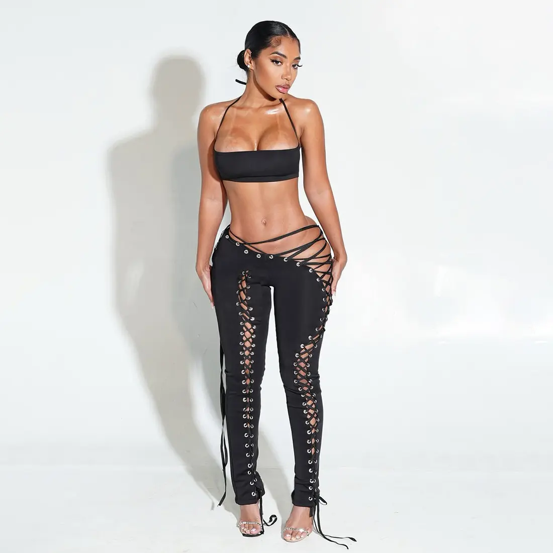 Trendy high-street hip-hop style two-piece set: a fitted, sexy solid-color tank top paired with adjustable drawstring cut-out trousers—a stretchy, versatile, and stylish ensemble.