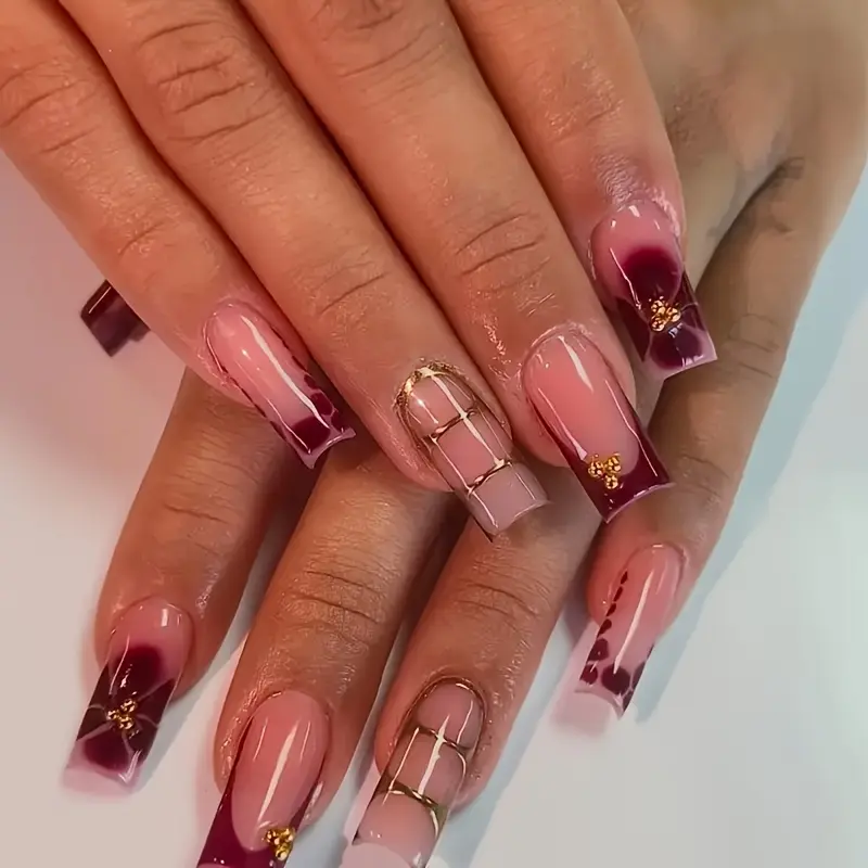 French Gradient Press-on Nails Set, 24 Medium-Long Tube-Shaped Reusable False Nails with Trendy Gold-Red Stripes, Rhinestone Accents and Floral Patterns