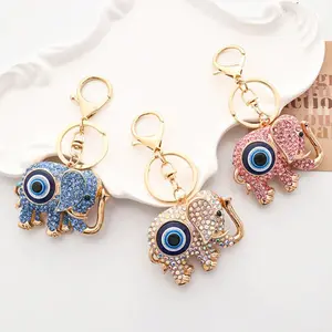 Rhinestone Elephant Keychain with Blue Evil Eye Detail, Cute Bling Bag Pendant, Stylish Car Key Charm & Holiday Gift Ornament
