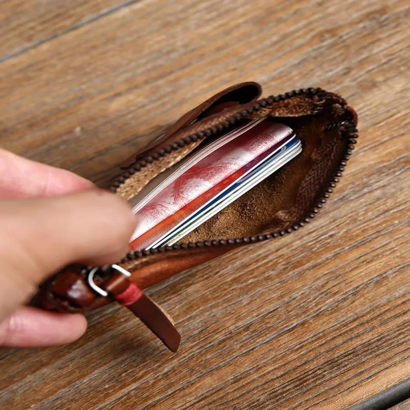 Stop wrapping gift cards in plastic bags.  This handmade genuine leather pouch is the holiday wish itself. Small, exquisite, and unforgettable.