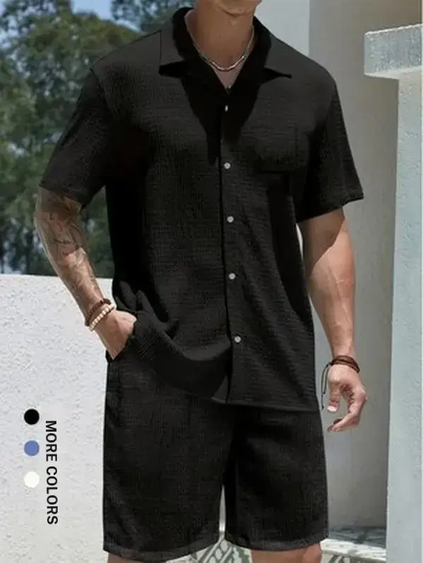 One men’s short sleeve shirt with a waffle texture and open front; trendy vacation style with a classic button front design featuring white buttons for refined details. Short sleeves suit spring and summer outfits. Smooth, stretchy fabric drapes well and,